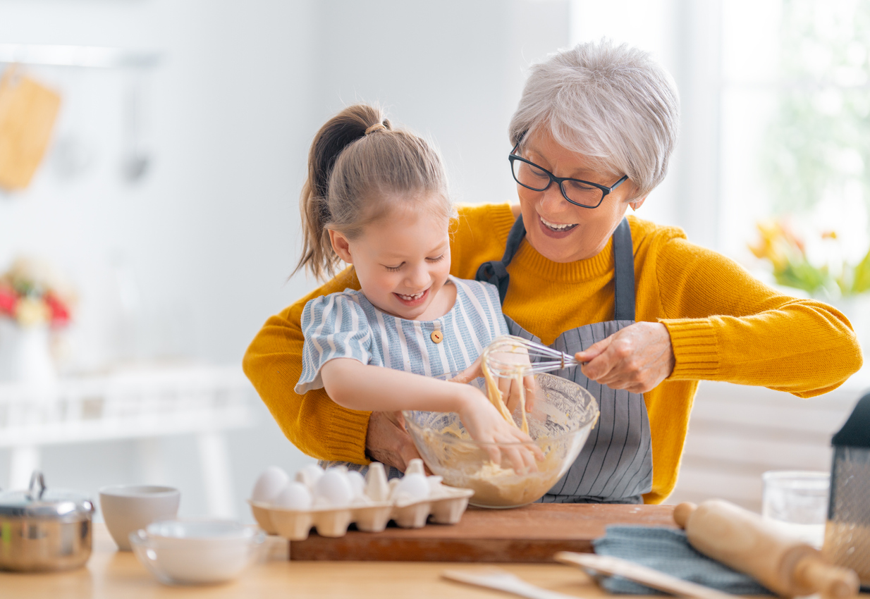 grandma and grandaughter baking