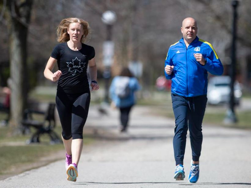 woman and man training for Boston Marathon