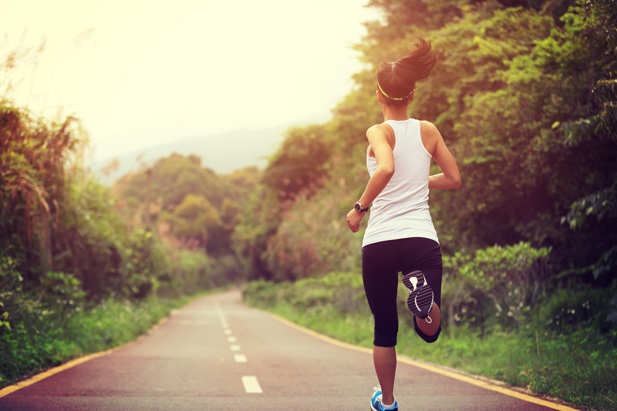 runner on paved trail