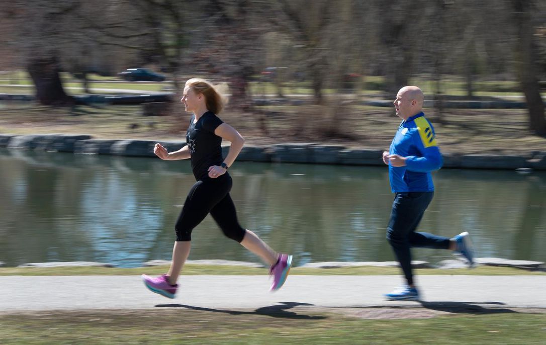 man and woman running