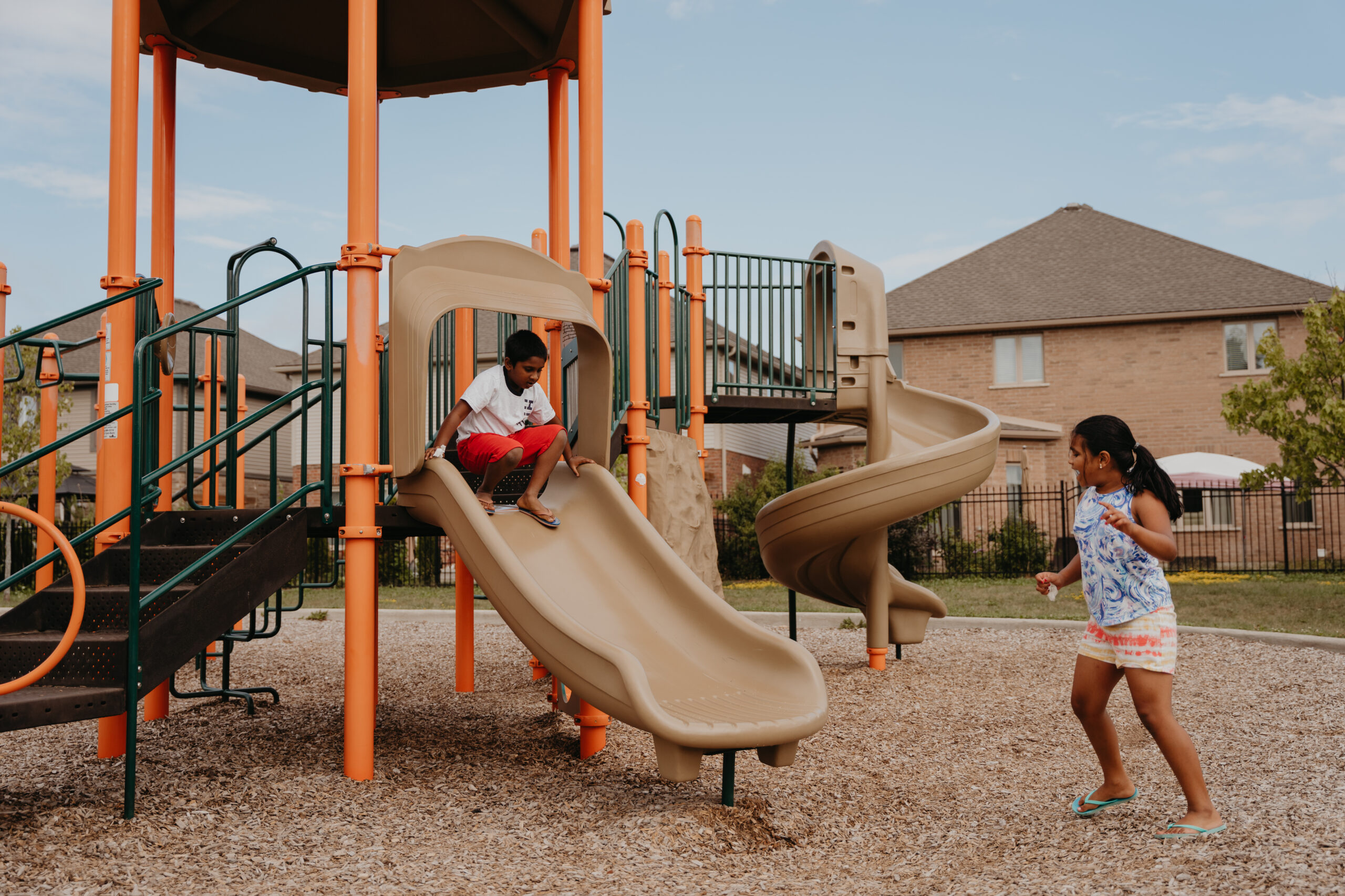 Children playing on playground structure